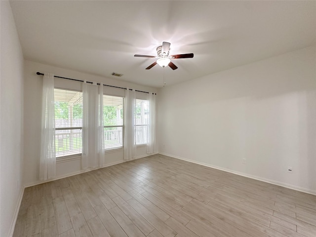 5310 Flagridge Ln, Houston, TX 77066 - empty room featuring a ceiling fan, light wood-type flooring, and baseboards