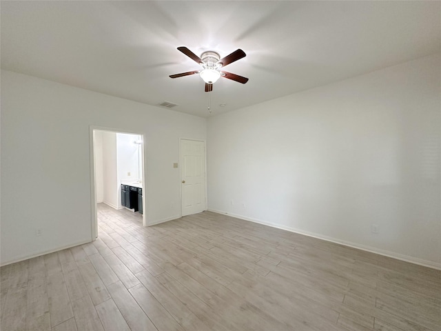 5310 Flagridge Ln, Houston, TX 77066 - spare room with ceiling fan, light wood-style floors, and baseboards