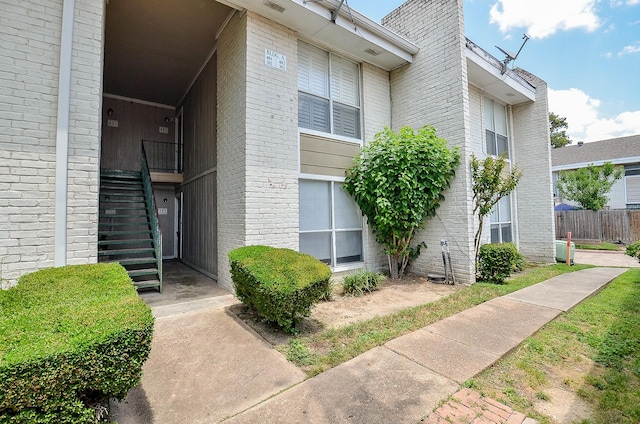 1950 Spenwick Dr Unit 302, Houston, TX 77055 - view of property featuring stairs and fence