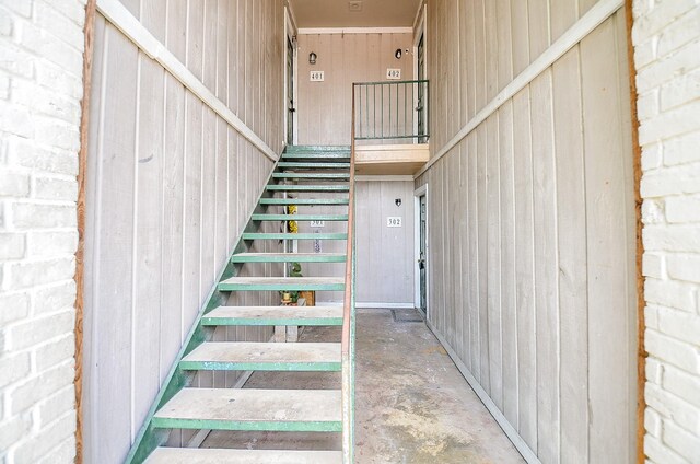 1950 Spenwick Dr Unit 302, Houston, TX 77055 - staircase with concrete flooring