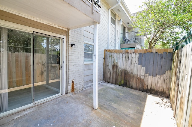 1950 Spenwick Dr Unit 302, Houston, TX 77055 - view of patio featuring fence