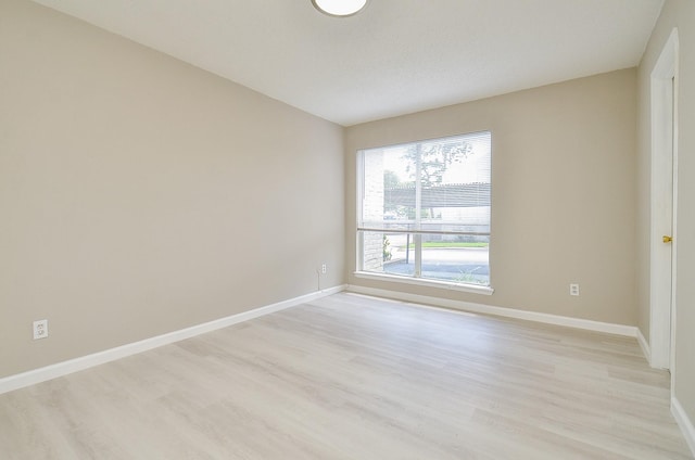 1950 Spenwick Dr Unit 302, Houston, TX 77055 - empty room with light wood-style floors and baseboards