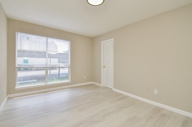 1950 Spenwick Dr Unit 302, Houston, TX 77055 - unfurnished room with light wood-style floors and baseboards