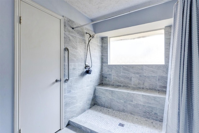 bathroom with a stall shower