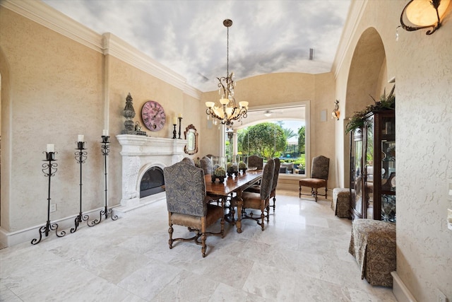 25 Kings Lake Estates Blvd, Humble, TX 77346 - dining area featuring arched walkways, a glass covered fireplace, a notable chandelier, and vaulted ceiling