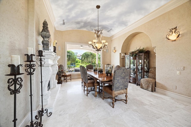 25 Kings Lake Estates Blvd, Humble, TX 77346 - dining area featuring arched walkways, a chandelier, baseboards, lofted ceiling, and ornamental molding