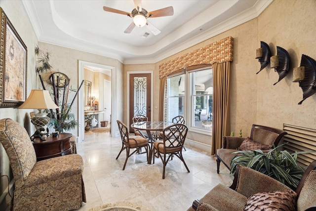 25 Kings Lake Estates Blvd, Humble, TX 77346 - dining space featuring visible vents, a ceiling fan, crown molding, and a tray ceiling