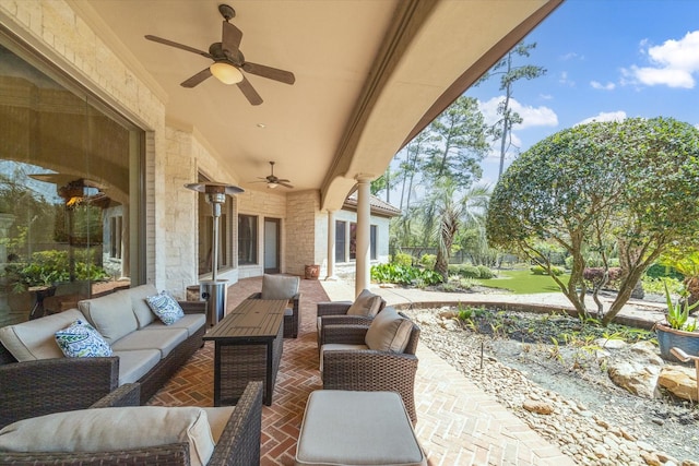 25 Kings Lake Estates Blvd, Humble, TX 77346 - view of patio featuring ceiling fan and outdoor lounge area