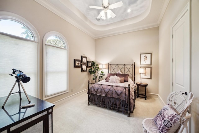 25 Kings Lake Estates Blvd, Humble, TX 77346 - bedroom featuring ceiling fan, crown molding, baseboards, a tray ceiling, and carpet flooring