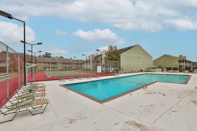 14777 Wunderlich Dr Unit 1103, Houston, TX 77069 - pool with a patio, a tennis court, fence, and a residential view