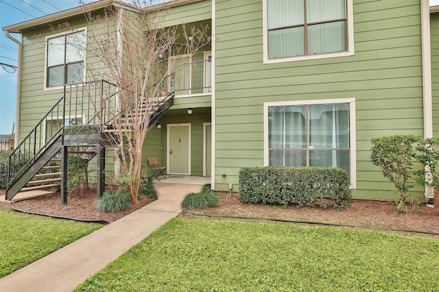 14777 Wunderlich Dr Unit 1103, Houston, TX 77069 - townhome / multi-family property with stairs and a front yard