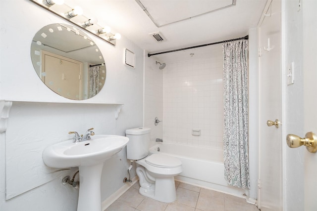 14777 Wunderlich Dr Unit 1103, Houston, TX 77069 - full bath with shower / tub combo with curtain, toilet, tile patterned floors, baseboards, and visible vents
