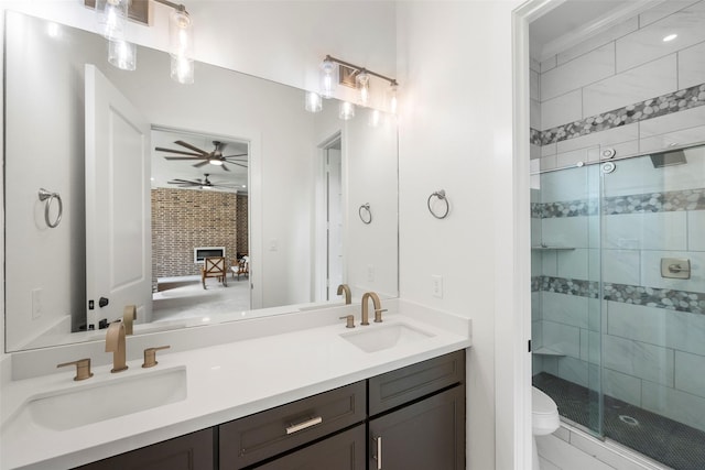 58-D Hickory Ridge Dr, Huffman, TX 77336 - ensuite bathroom with a sink, a ceiling fan, a shower stall, and toilet