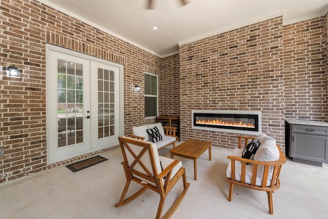 58-D Hickory Ridge Dr, Huffman, TX 77336 - view of patio featuring french doors and an outdoor living space with a fireplace
