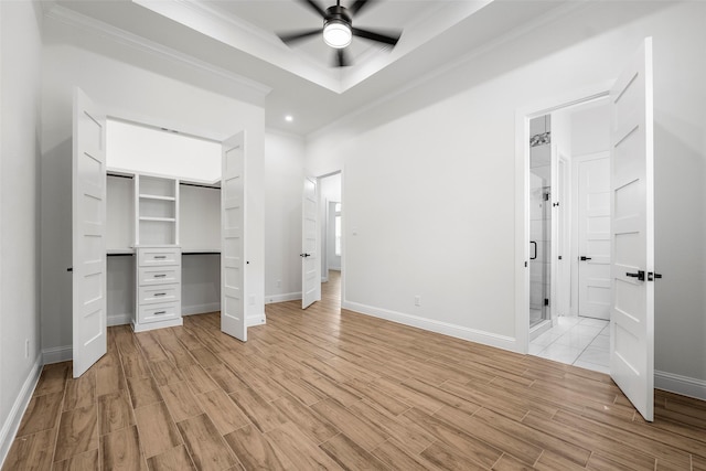 58-D Hickory Ridge Dr, Huffman, TX 77336 - unfurnished bedroom with baseboards, light wood finished floors, and crown molding