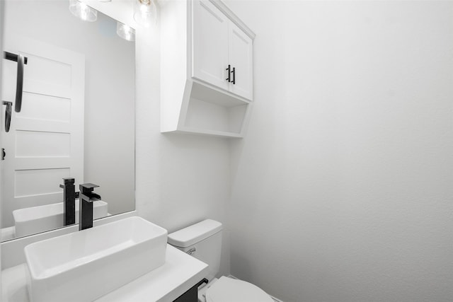 58-D Hickory Ridge Dr, Huffman, TX 77336 - half bathroom featuring vanity and toilet