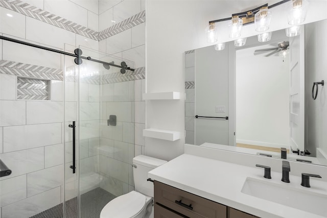 58-D Hickory Ridge Dr, Huffman, TX 77336 - full bath with vanity, a shower stall, a ceiling fan, and toilet