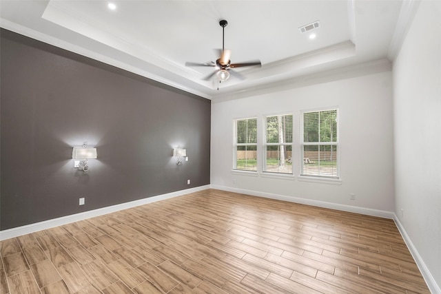 58-D Hickory Ridge Dr, Huffman, TX 77336 - unfurnished room with a ceiling fan, a tray ceiling, visible vents, and ornamental molding