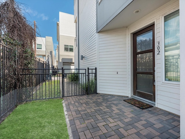 302 Eado Park Cir, Houston, TX 77020 - doorway to property featuring fence and a yard