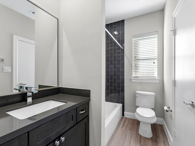 302 Eado Park Cir, Houston, TX 77020 - full bathroom with toilet, baseboards, visible vents, and vanity