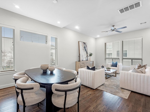 302 Eado Park Cir, Houston, TX 77020 - dining room with visible vents, wood finished floors, and a healthy amount of sunlight