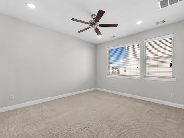 302 Eado Park Cir, Houston, TX 77020 - spare room featuring baseboards, visible vents, and light carpet
