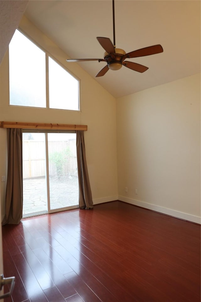 1035 Wirt Rd, Houston, TX 77055 - unfurnished room with ceiling fan, dark wood-style floors, baseboards, and high vaulted ceiling