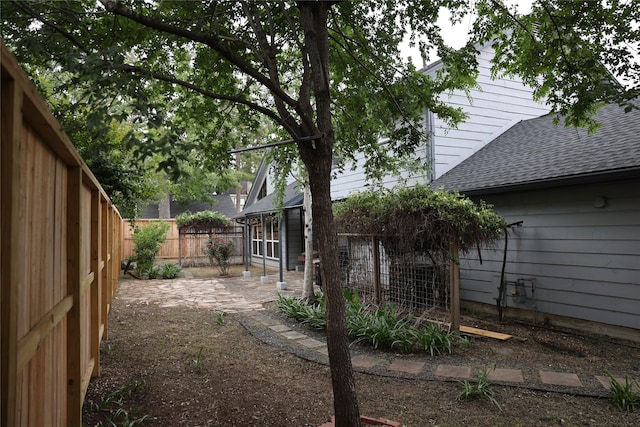 1035 Wirt Rd, Houston, TX 77055 - view of yard featuring a patio and a fenced backyard