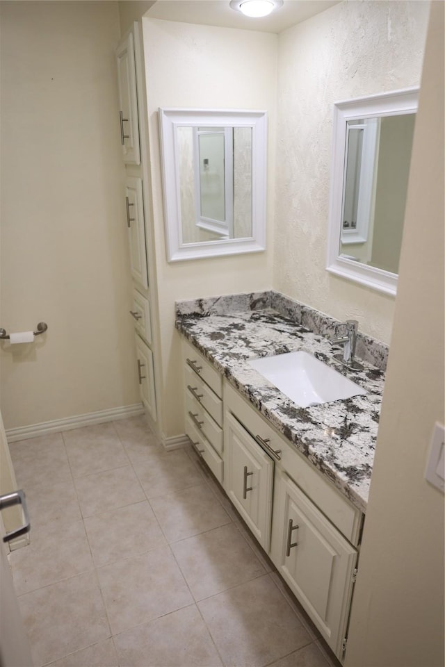 1035 Wirt Rd, Houston, TX 77055 - bathroom with tile patterned flooring and vanity
