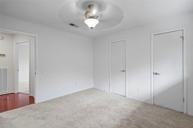 1035 Wirt Rd, Houston, TX 77055 - unfurnished bedroom with carpet floors and a ceiling fan