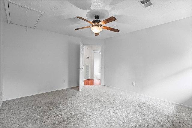 1035 Wirt Rd, Houston, TX 77055 - empty room with attic access, carpet, and a ceiling fan