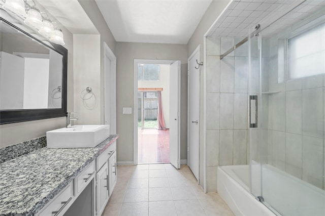 1035 Wirt Rd, Houston, TX 77055 - full bath featuring vanity, tile patterned flooring, and enclosed tub / shower combo