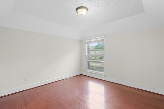 1035 Wirt Rd, Houston, TX 77055 - empty room featuring wood finished floors and a textured ceiling