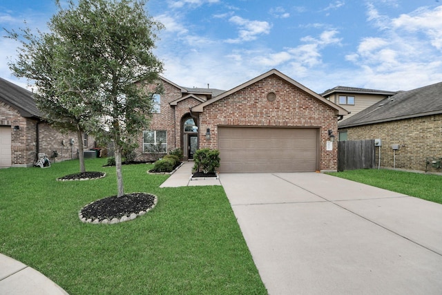 view of front facade featuring brick siding, driveway, a front lawn, and a garage