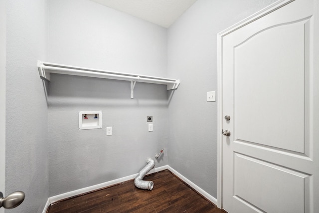 22507 Bellwick Ridge Ln, Katy, TX 77449 - washroom featuring laundry area, gas dryer hookup, electric dryer hookup, baseboards, and dark wood-style floors