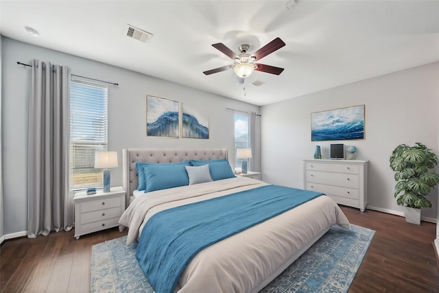 22507 Bellwick Ridge Ln, Katy, TX 77449 - bedroom with baseboards, dark wood-type flooring, and visible vents