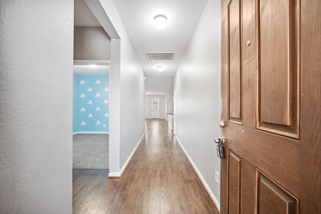 22507 Bellwick Ridge Ln, Katy, TX 77449 - hall featuring baseboards, dark wood-style floors, and visible vents