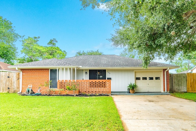 123 S Yaupon St, Lake Jackson, TX 77566 - ranch-style house with driveway, a front yard, brick siding, fence, and an attached garage