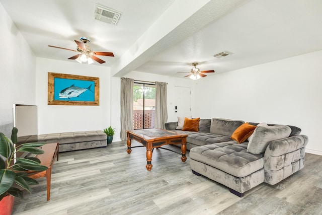 123 S Yaupon St, Lake Jackson, TX 77566 - living area featuring visible vents, ceiling fan, and wood finished floors