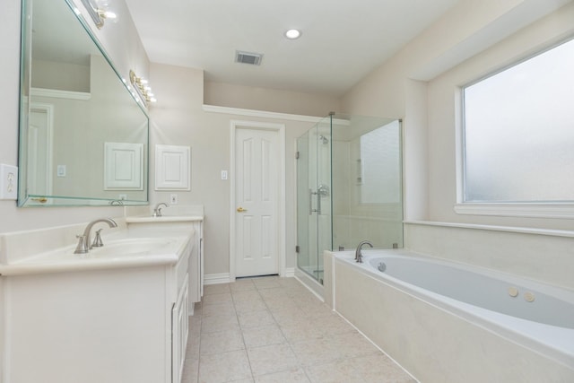 full bathroom featuring visible vents, double vanity, tile patterned flooring, a bath, and a shower stall