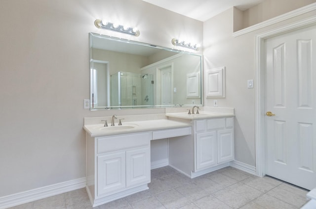 bathroom with a sink, tile patterned floors, a shower stall, and double vanity