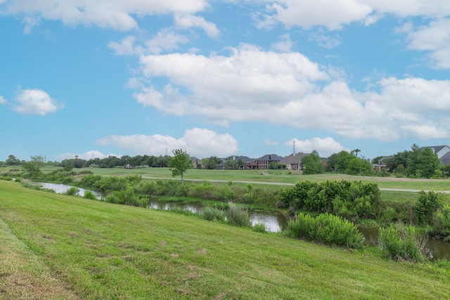 view of yard with a water view