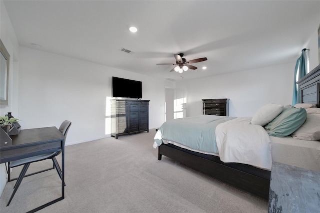 bedroom with ceiling fan, light carpet, visible vents, and recessed lighting