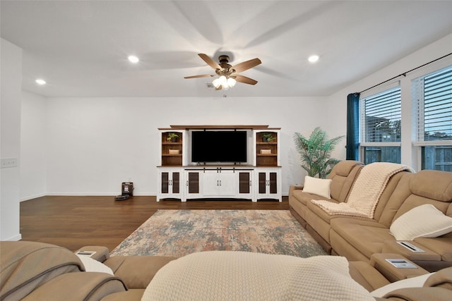 living area featuring ceiling fan, recessed lighting, baseboards, and wood finished floors
