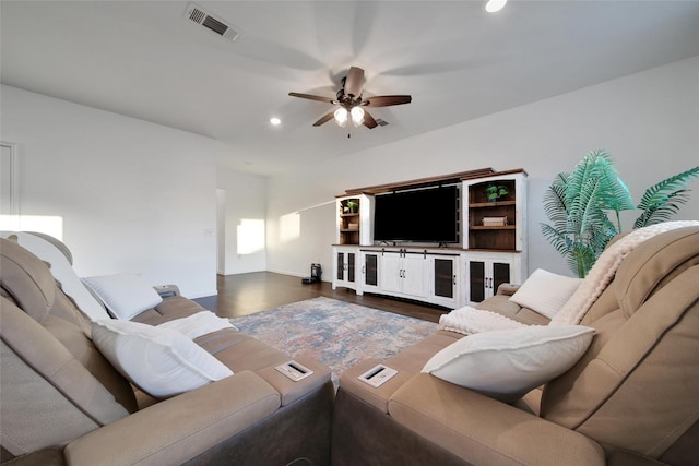 living area with ceiling fan, dark wood-type flooring, visible vents, and recessed lighting