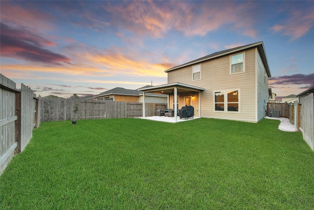 back of property featuring central AC, a yard, a patio, and a fenced backyard