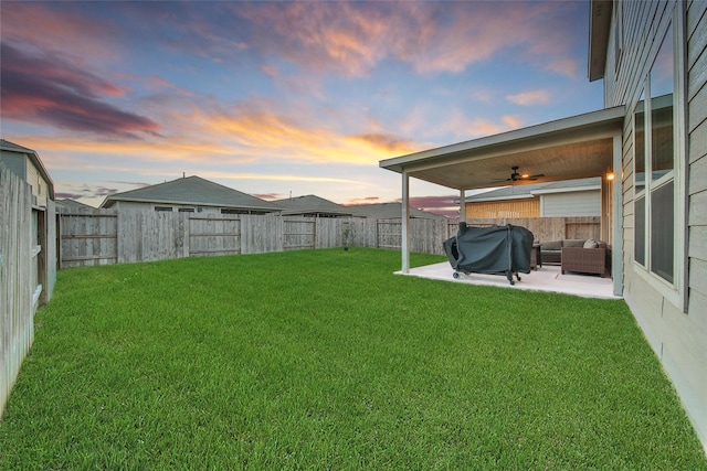 16322 Fontana Ct, Conroe, TX 77302 - yard at dusk featuring an outdoor living space, a ceiling fan, and a patio