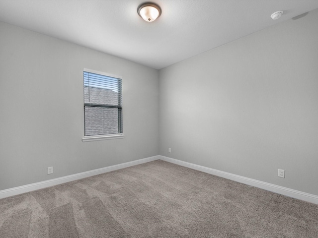 16926 Grayson Woods Ln, Humble, TX 77346 - unfurnished room featuring carpet floors and baseboards