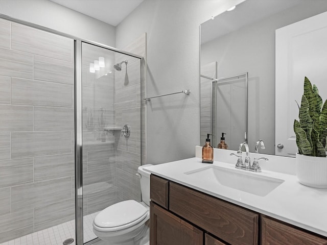 16926 Grayson Woods Ln, Humble, TX 77346 - full bathroom featuring toilet, a shower stall, and vanity