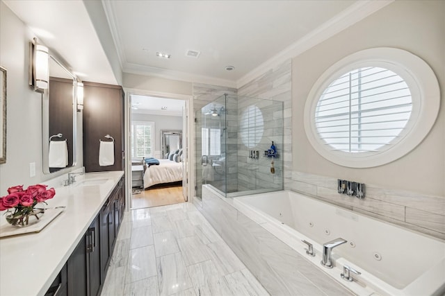 bathroom with crown molding, vanity, ensuite bath, a tub with jets, and a shower stall